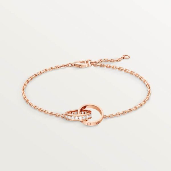 CARTIER LOVE BRACELET, HALF-PAVED WITH DIAMONDS 18K ROSE GOLD