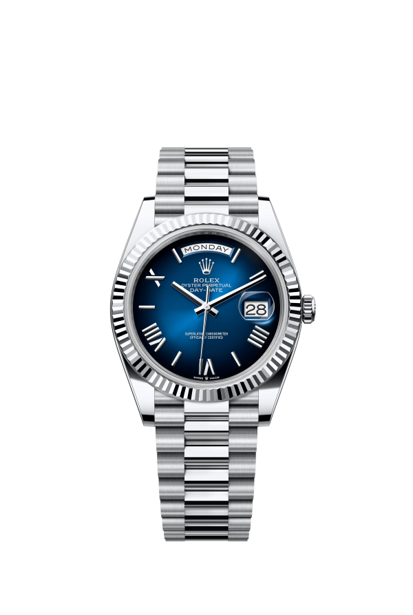 The Oyster Perpetual Day-Date 40 in platinum with a graduated blue dial, fluted bezel and President bracelet. -m228236-0024