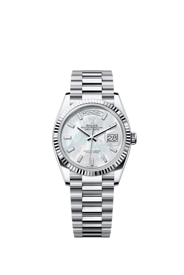The Oyster Perpetual Day-Date 36 in platinum with a diamond-set white mother-of-pearl dial, fluted bezel and President bracelet. -m128236-0021