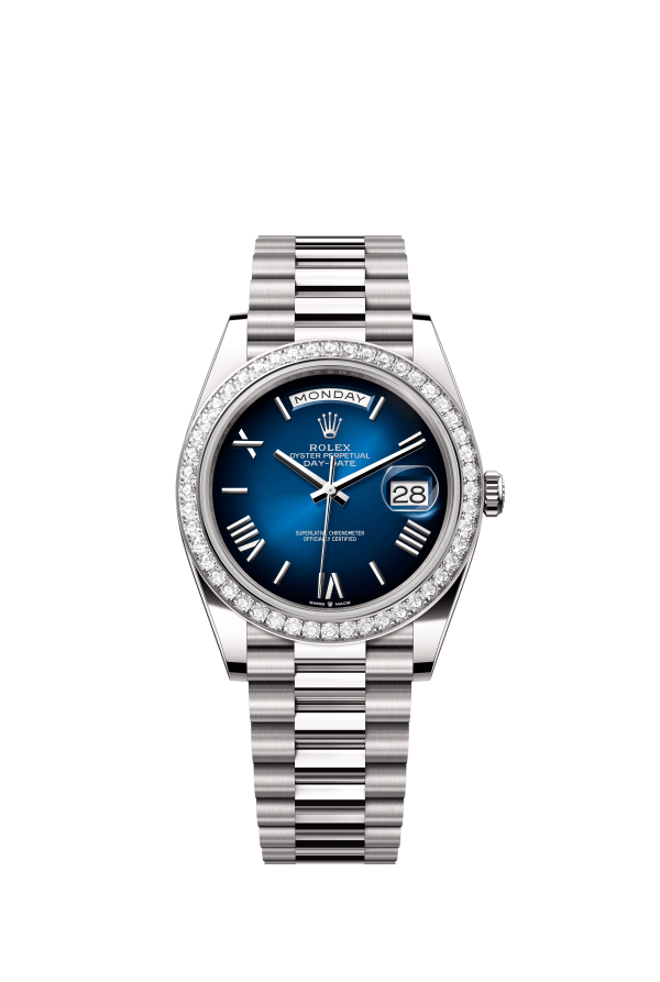The Oyster Perpetual Day-Date 40 in 18 ct white gold with a graduated blue dial, diamond-set bezel and President bracelet. -m228349rbr-0045